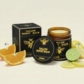 Citrus balm with yellow text
